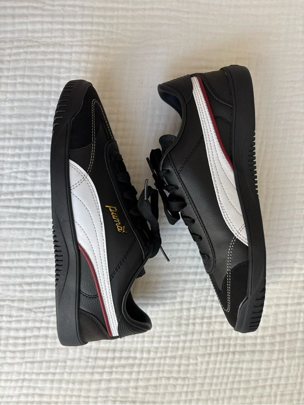 Puma Black White Low-Top Sneakers with Red Accent and Gold Logo